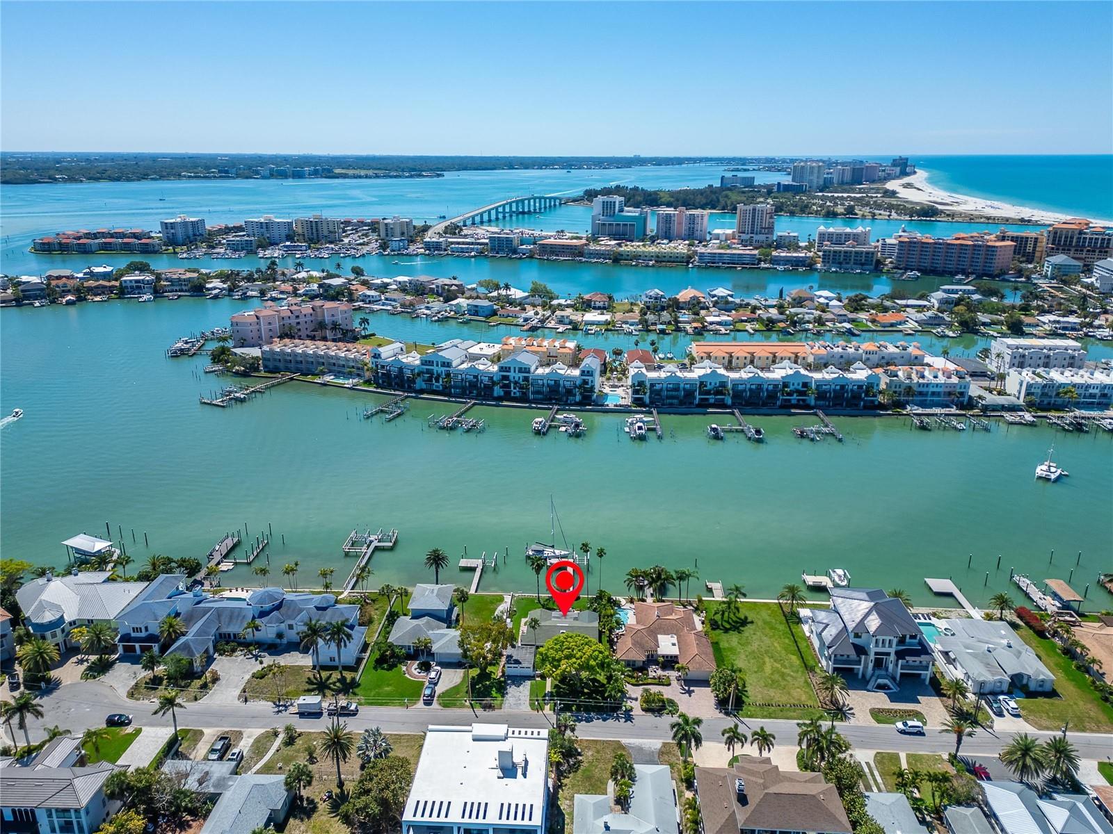 Great aerial shot of this amazing home showing the fixed Sand Key Bridge where you have quick access to the Gulf of Mexico!  What else could you ask for!!!