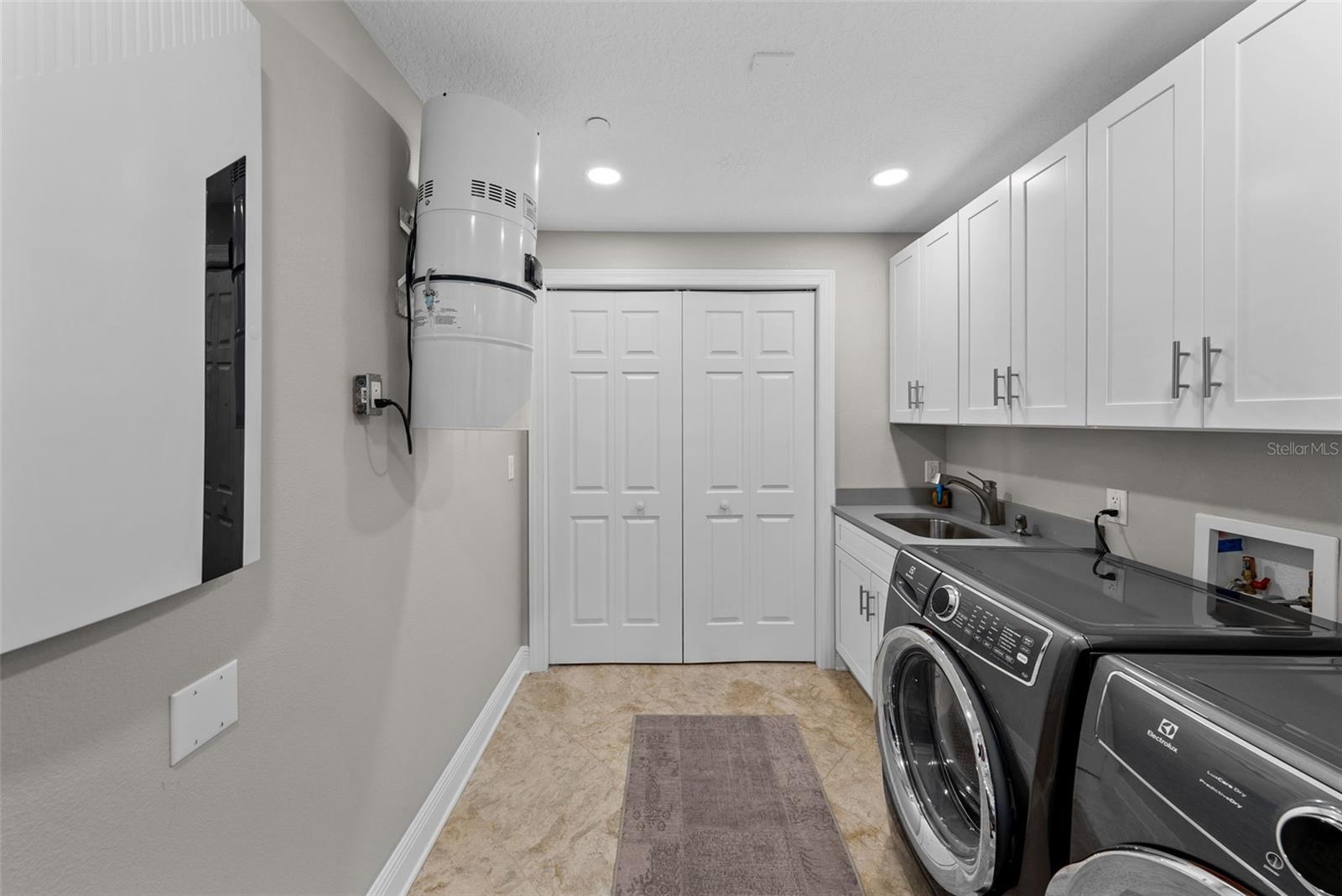 LAUNDRY ROOM OFF OF KITCHEN