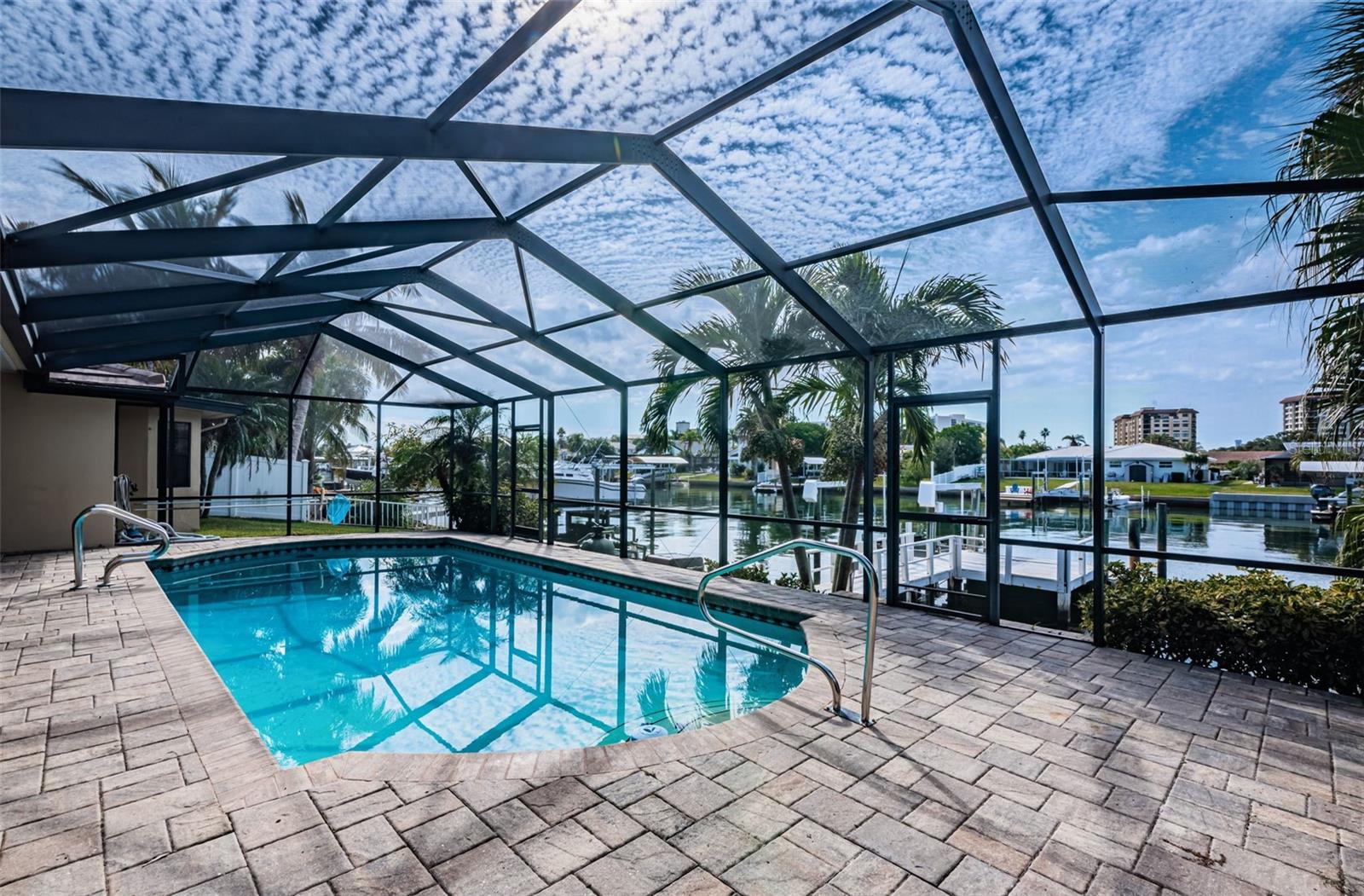 It comes complete with a screened lanai and a refreshing pool, offering the perfect blend of relaxation and recreation. The lanai provides a bug-free oasis where you can unwind, dine, or simply soak up the sun.