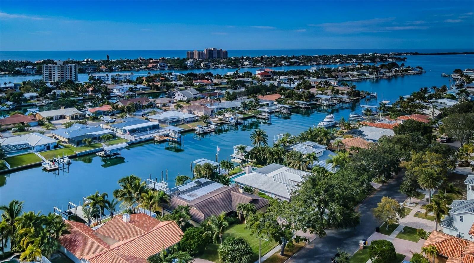 This aerial view captures the perfect blend of tranquility, suburban warmth, and a captivating waterview, making it an ideal haven for those seeking a place to call home.