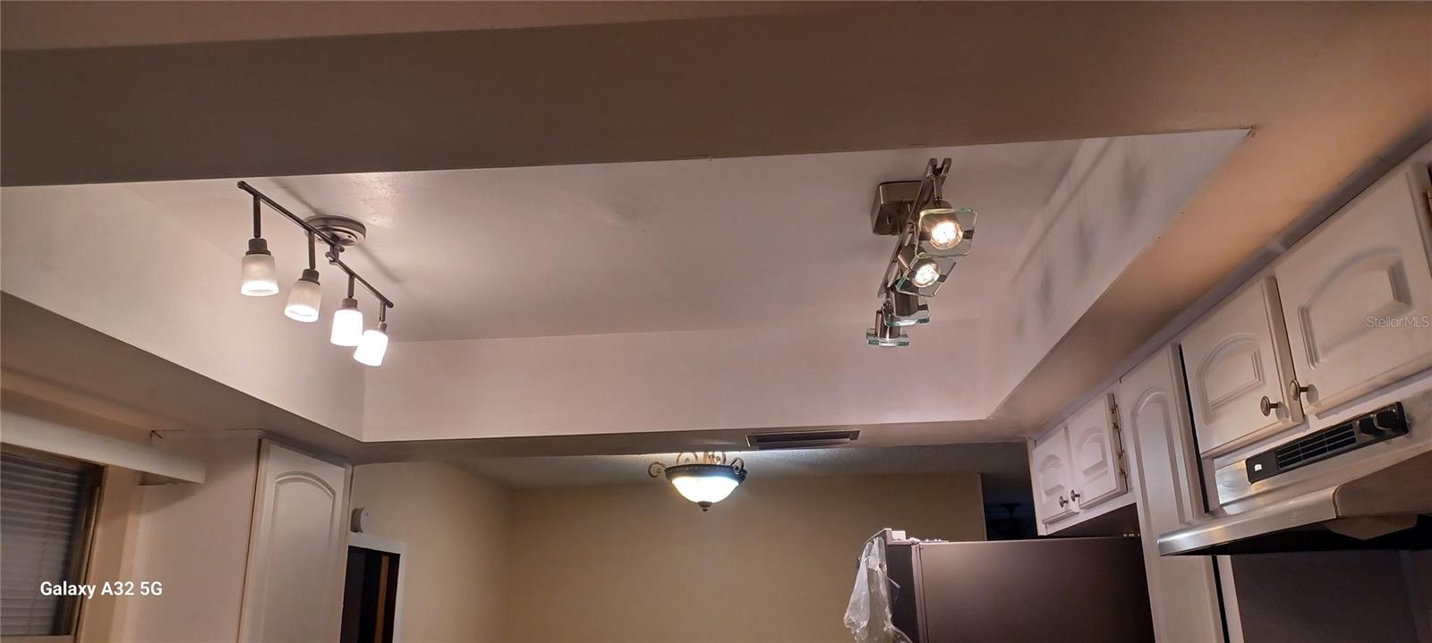updated vault ceiling and new lights in kitchen
