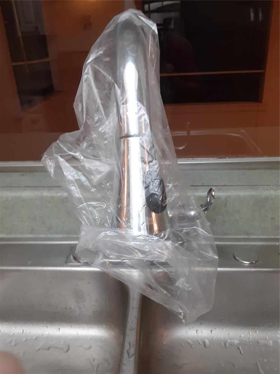 new stainless steel pulldown kitchen faucet