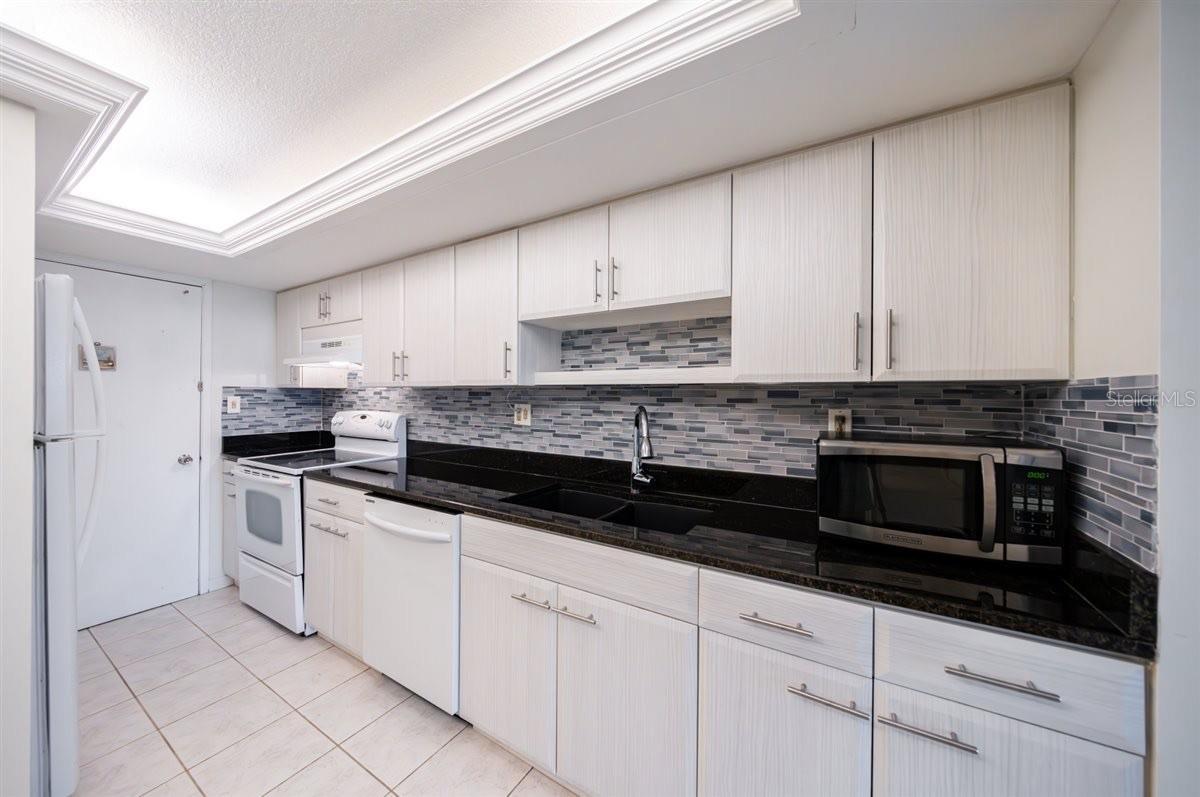 Perfect eat-in kitchen with additional exterior door for groceries.