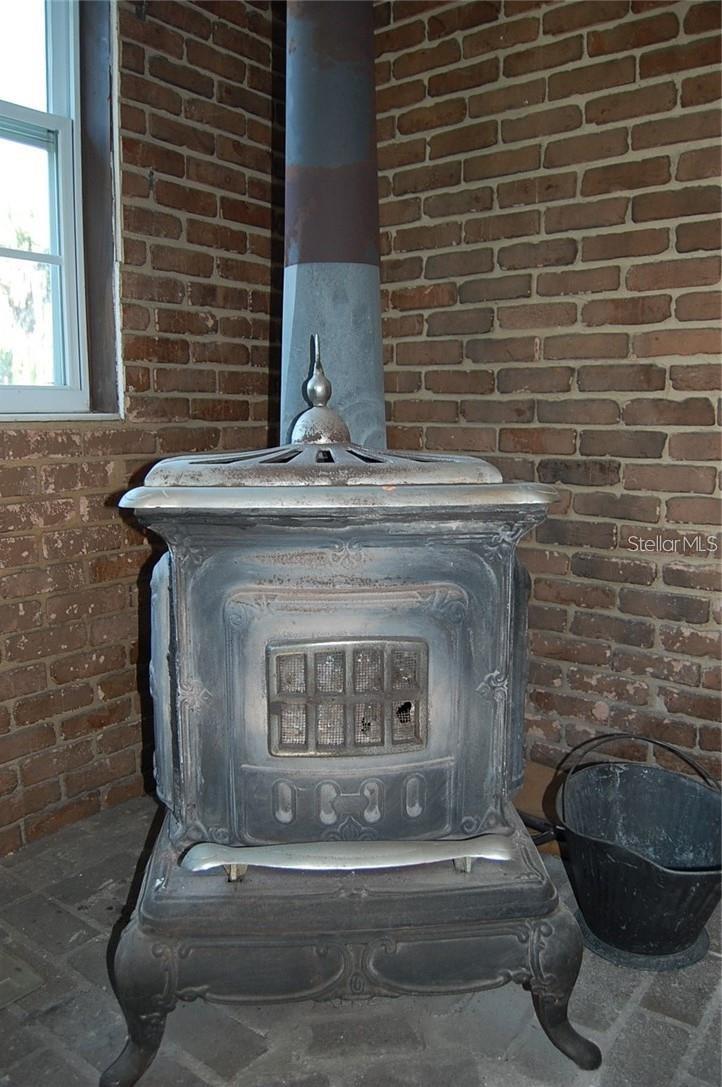 very cute fire furnace in dinning/family room