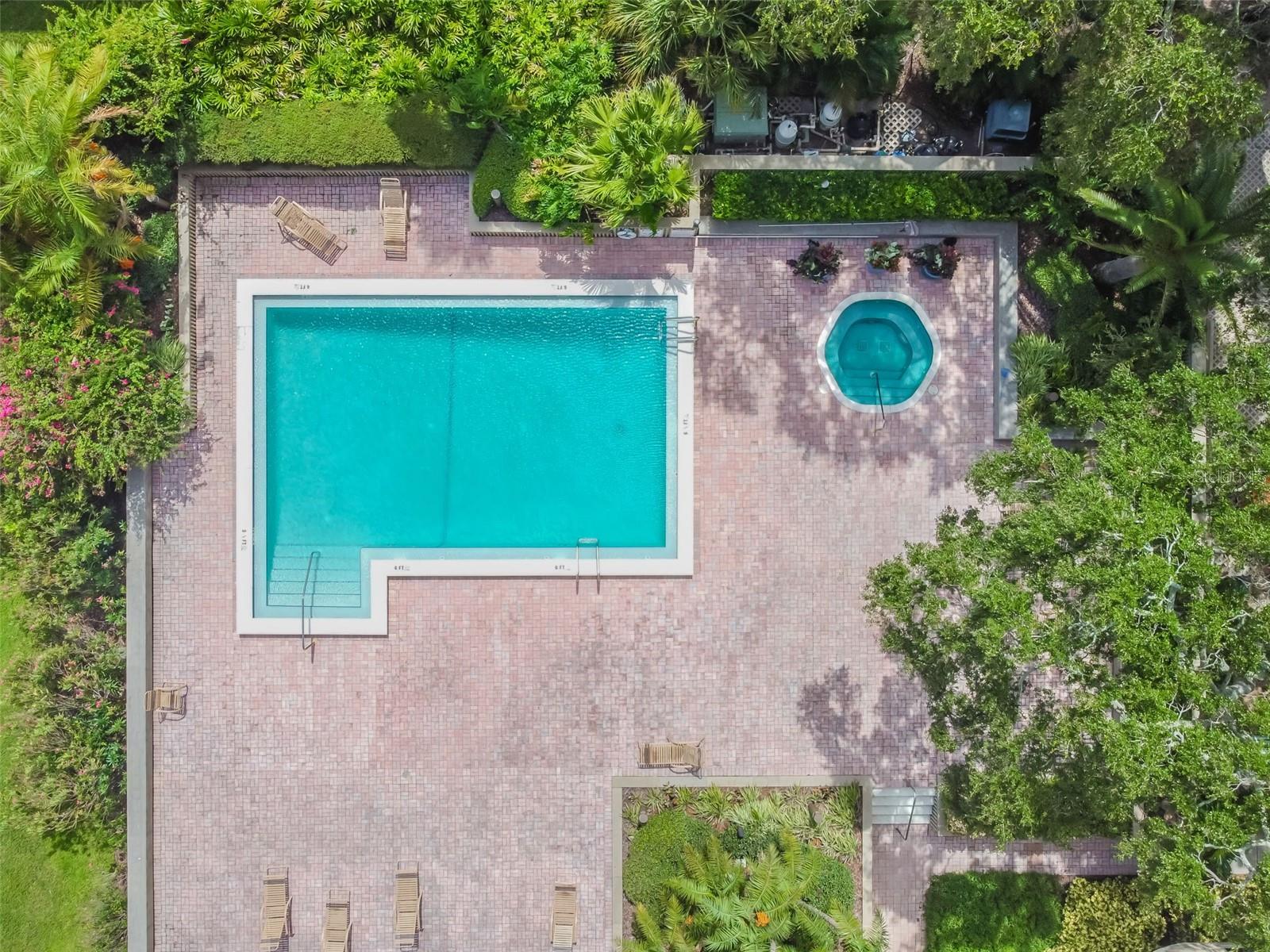 View of the community pool from the condo's private balcony