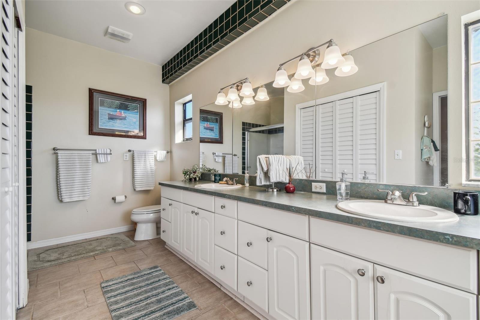 Large master bathroom with dual sinks