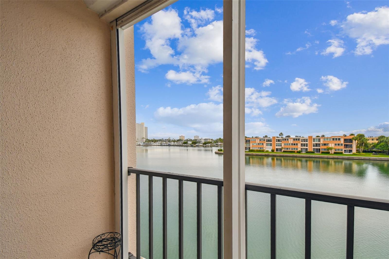 Waterfront balcony with hurricane shutters