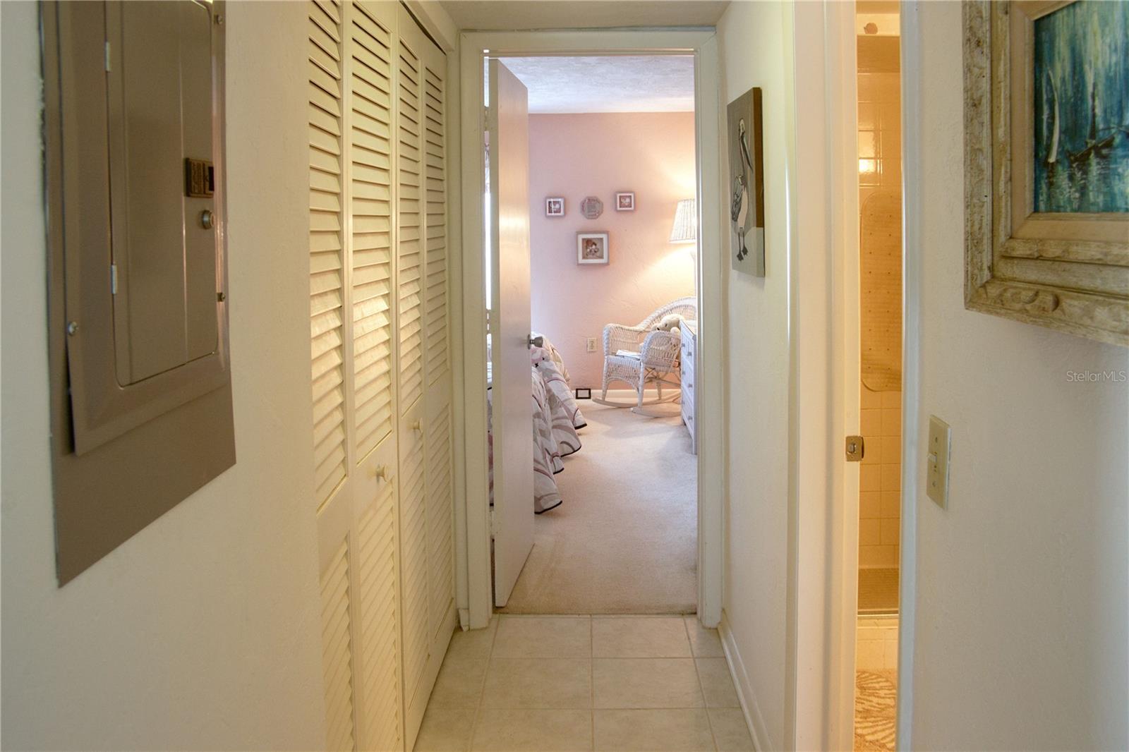 hallway to guest suite, storage!