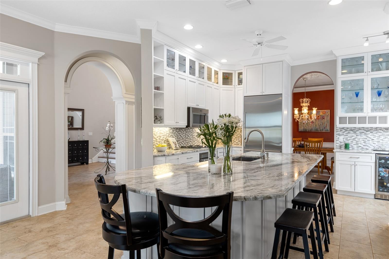 Custom Granite island with breakfast bar, offering the perfect space to gather with friends and family.