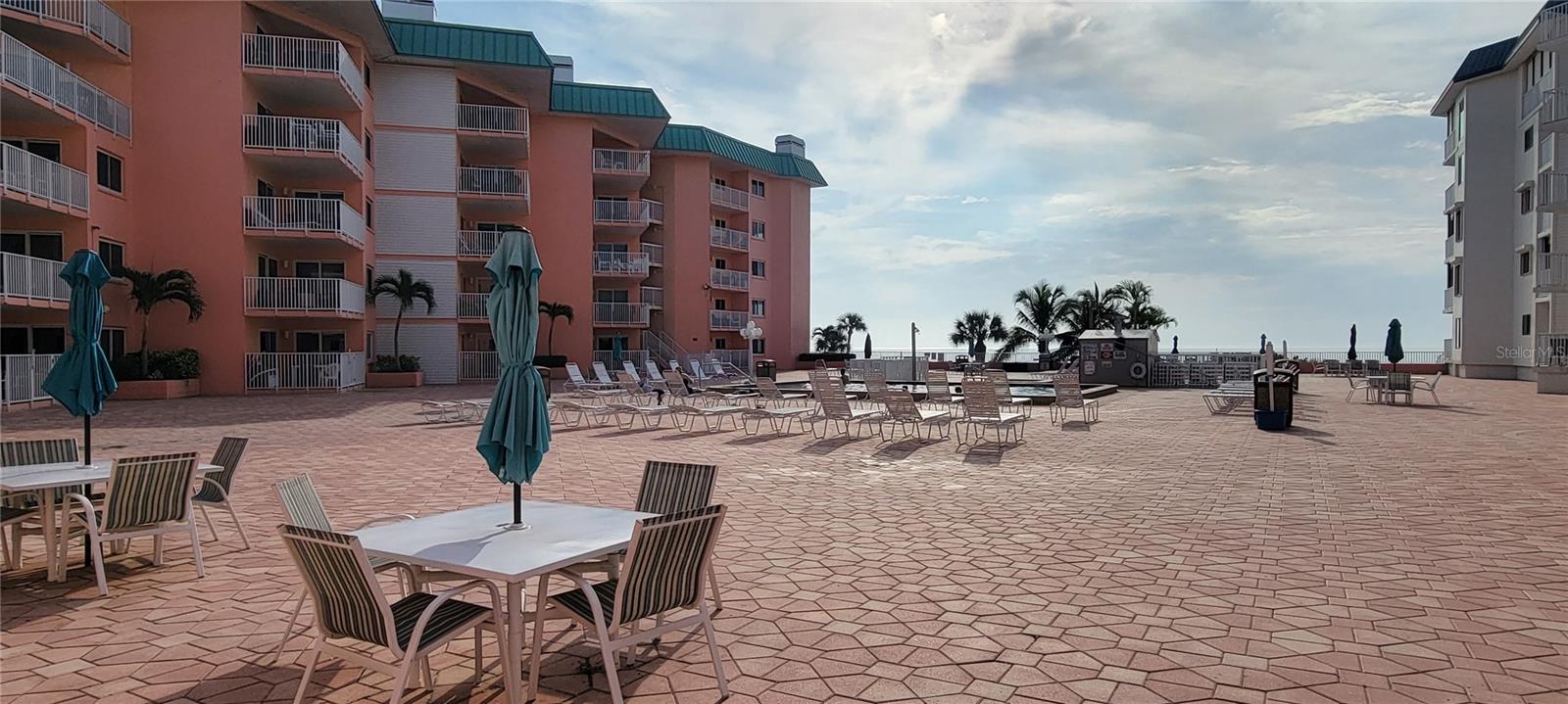 Huge pool deck overlooks the beach and Gulf of Mexico