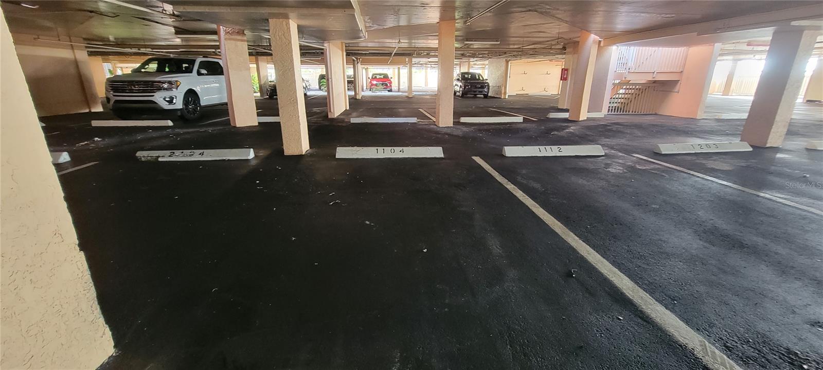 Owners have one assigned parking space in the under-building garage