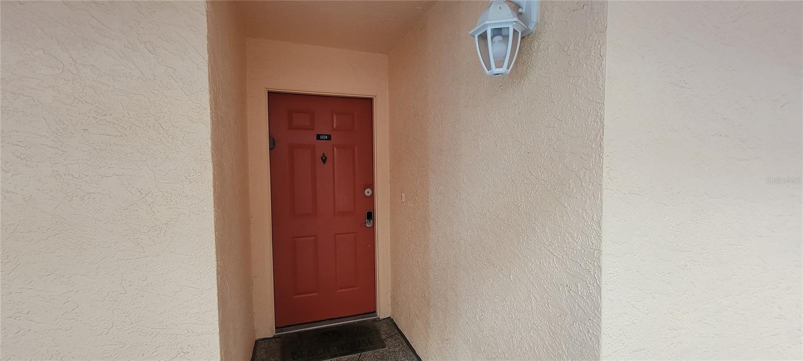 1104 entrance has door keypad and additional lockbox at door for convenience of owner or renters