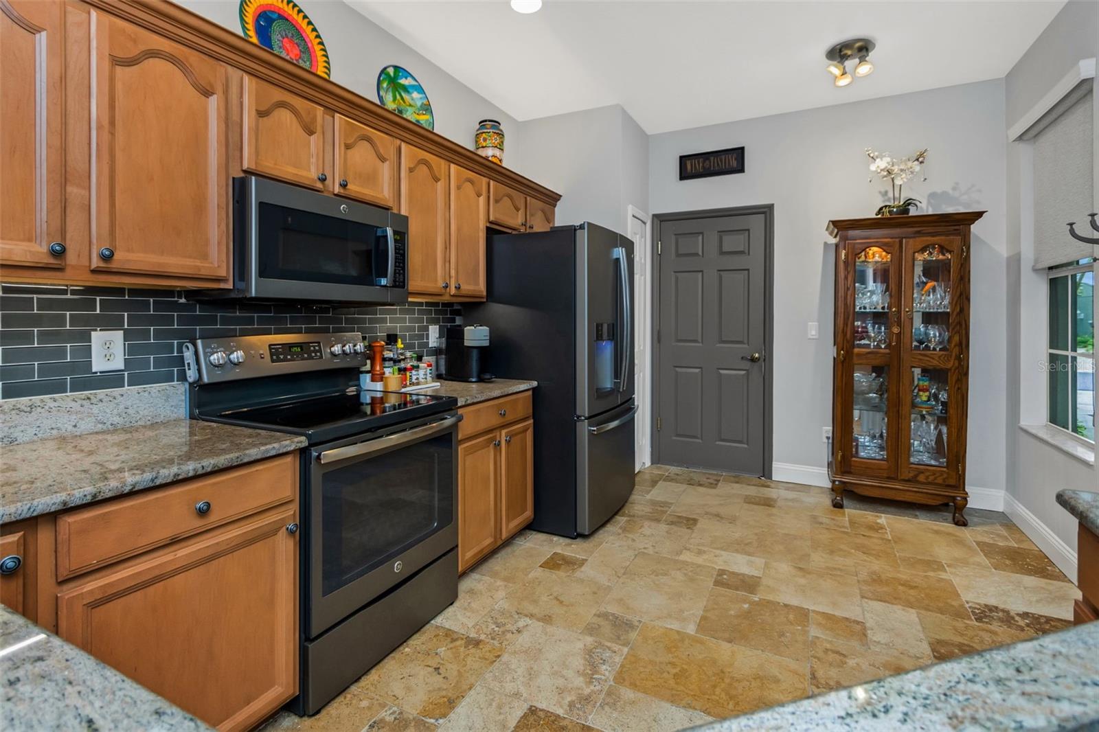 Large Kitchen with Slate Appliances and Granite Countertops