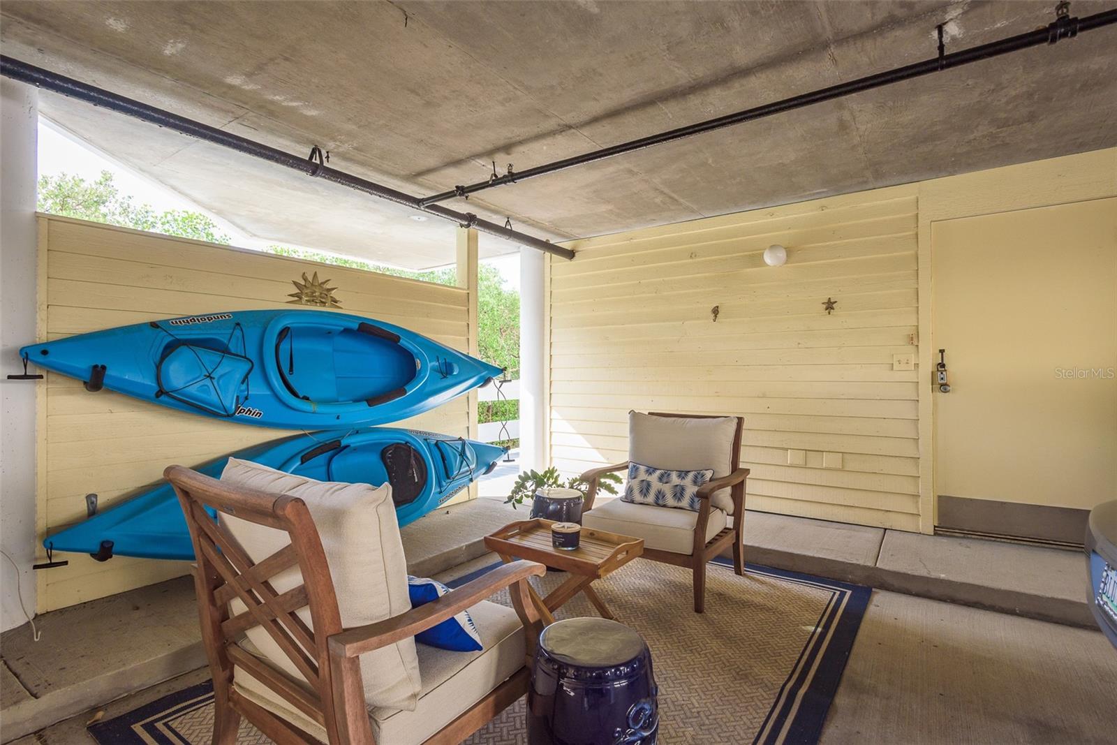 plenty of room for kayaks and "toys' in the carport - also a storage closet