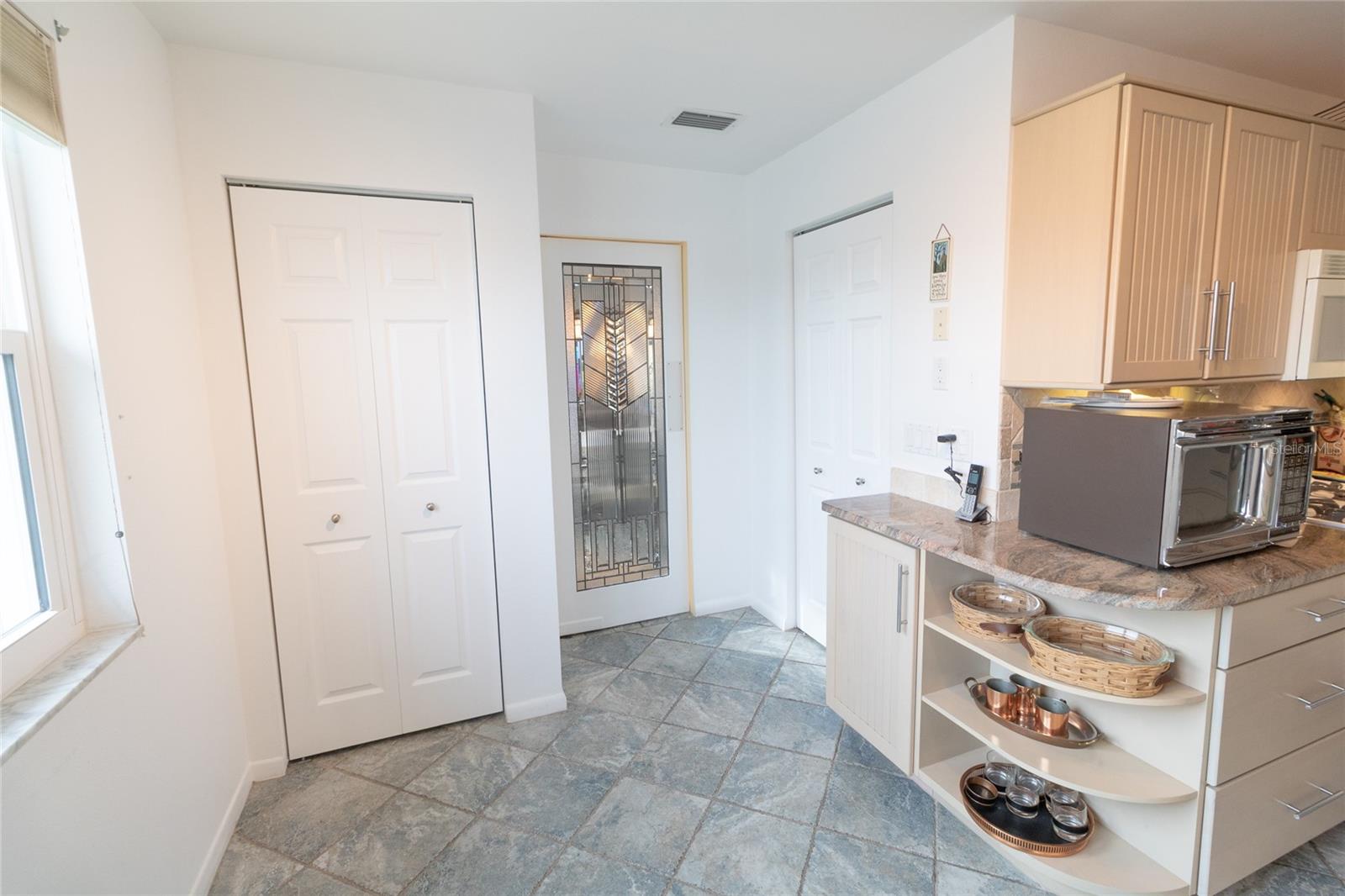 Kitchen Area with Closet Pantry & Walk-in Pantry with Washer & Dryer!