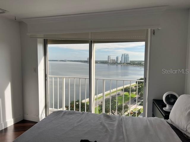 GORGEOUS VIEW OF TAMPA BAY FROM THE SECONDARY BEDROOM WITH BALCONY, NEW SOLAR SHADES AND WOOD CORNICES!