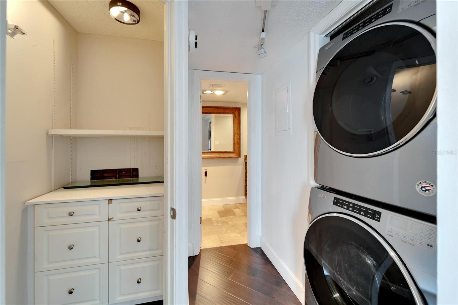 PASS THROUGH UTILITY AREA BY THE 2ND BEDROOM AND BATH WITH EXTRA STORAGE CLOSET