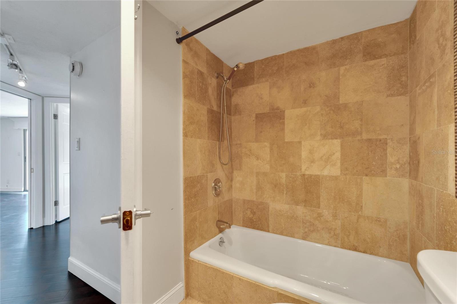 BEAUTIFULLY TRAVERNTINE TILE SHOWER AREA