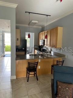 LOOKING AT KITCHEN FROM LIVINGROOM AREA