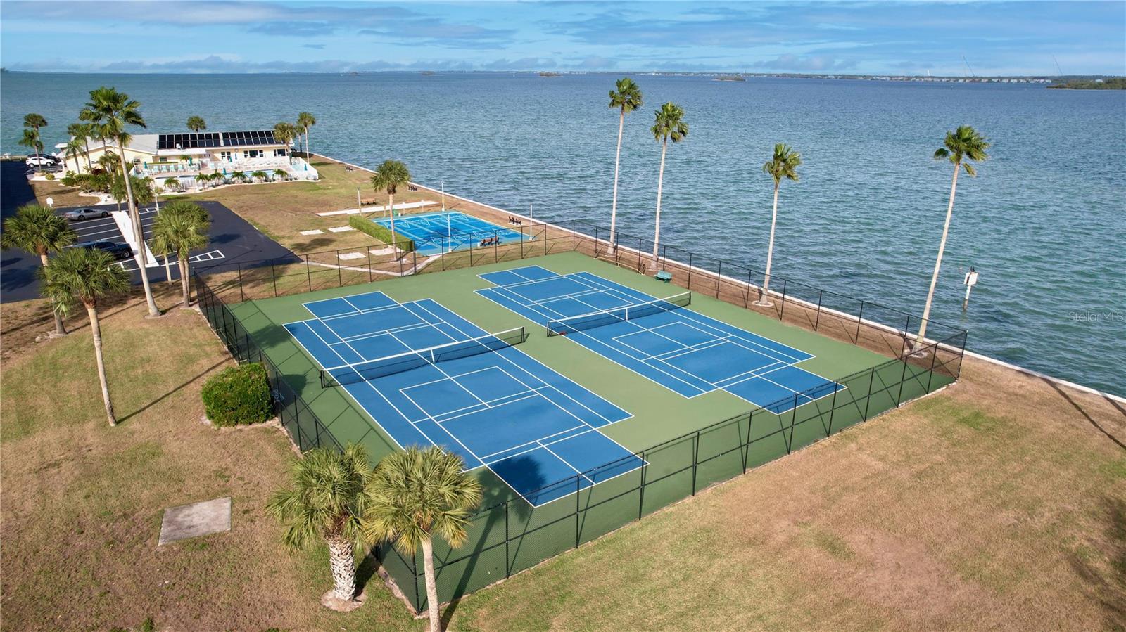 Pickle Ball with a veiw- Catch the Dolphins jumping -feeding.