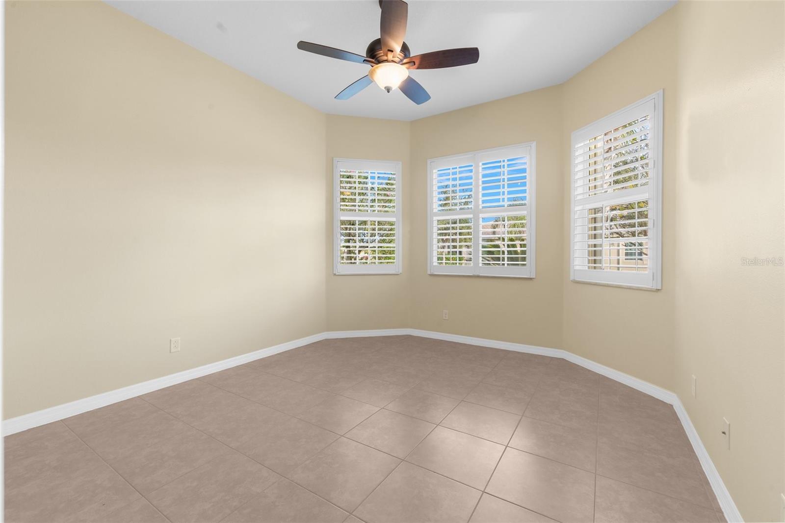 Front Bedroom with beautiful bay style windows and plantation shutters