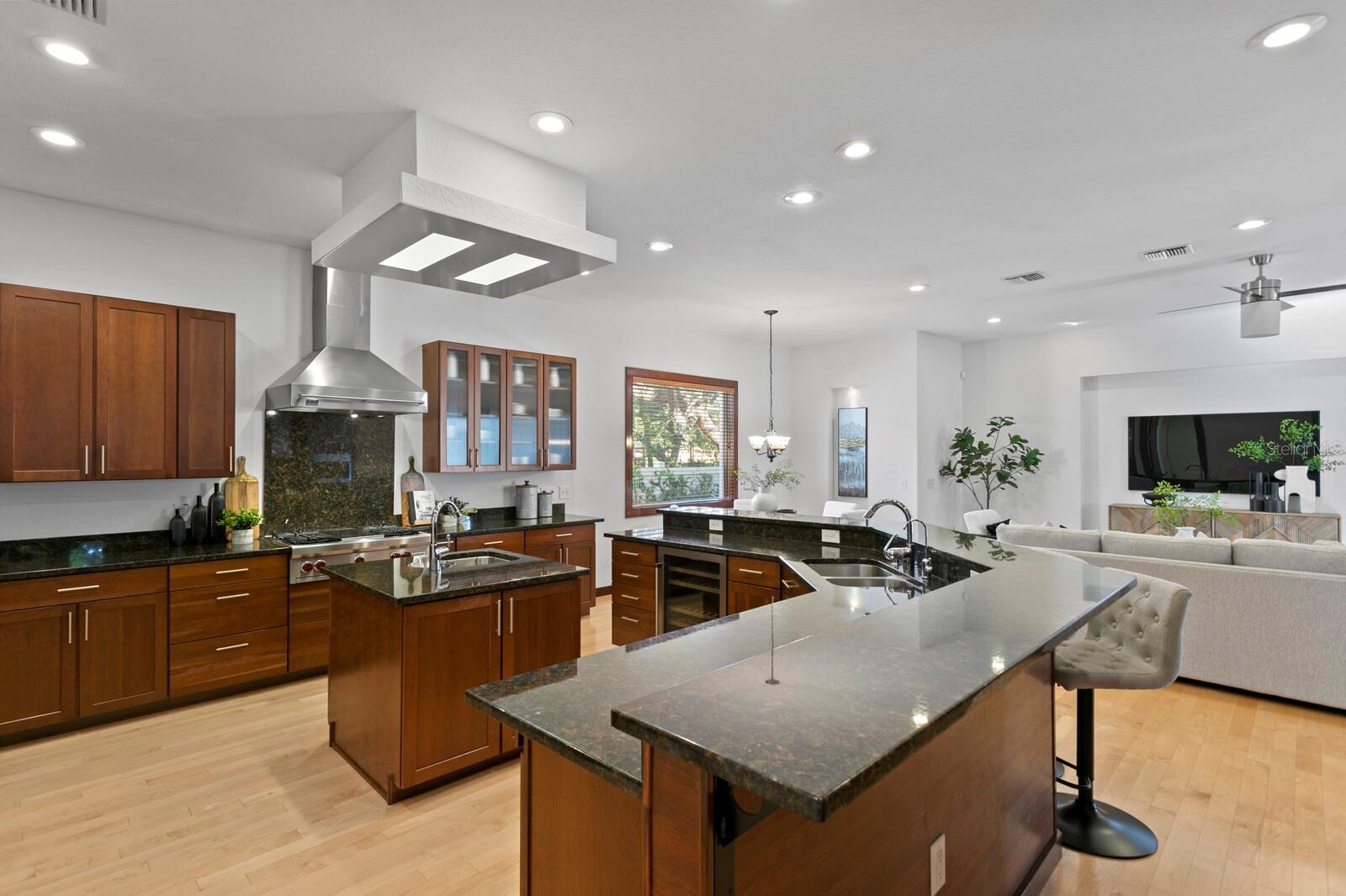 Wrap around granite counters provide ample space for preparing meals