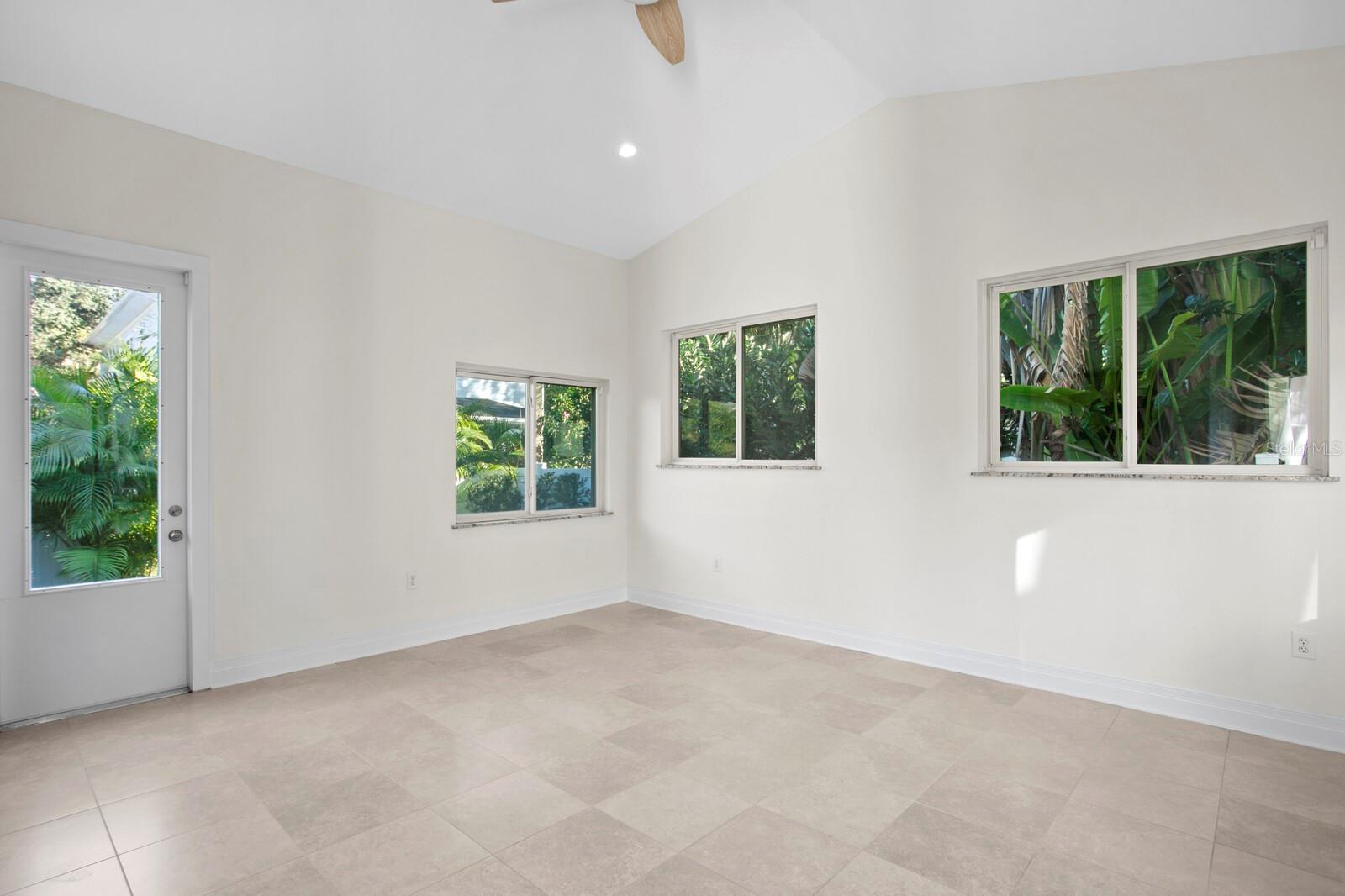 The bonus room is flooded with natural light and would make a perfect home office, gym or yoga studio