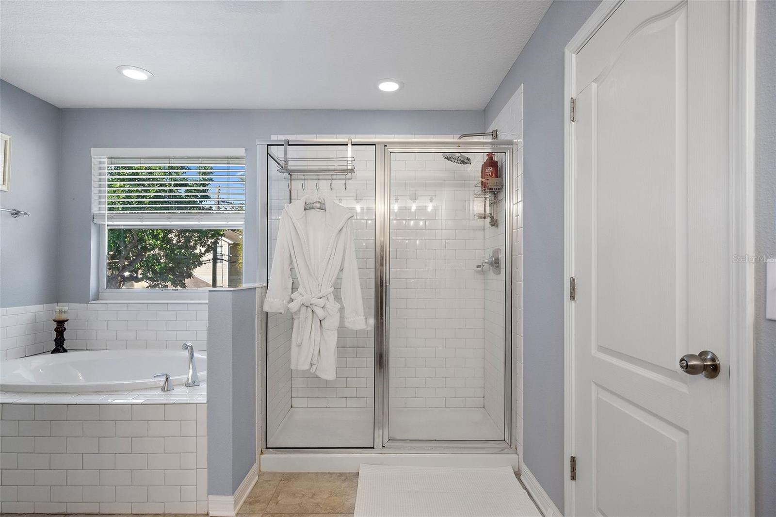 Master bath with garden tub and walk in shower.