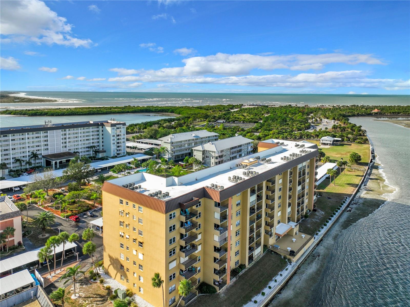 Aerial view of rear of buidling with Honeymoon Island in the distance