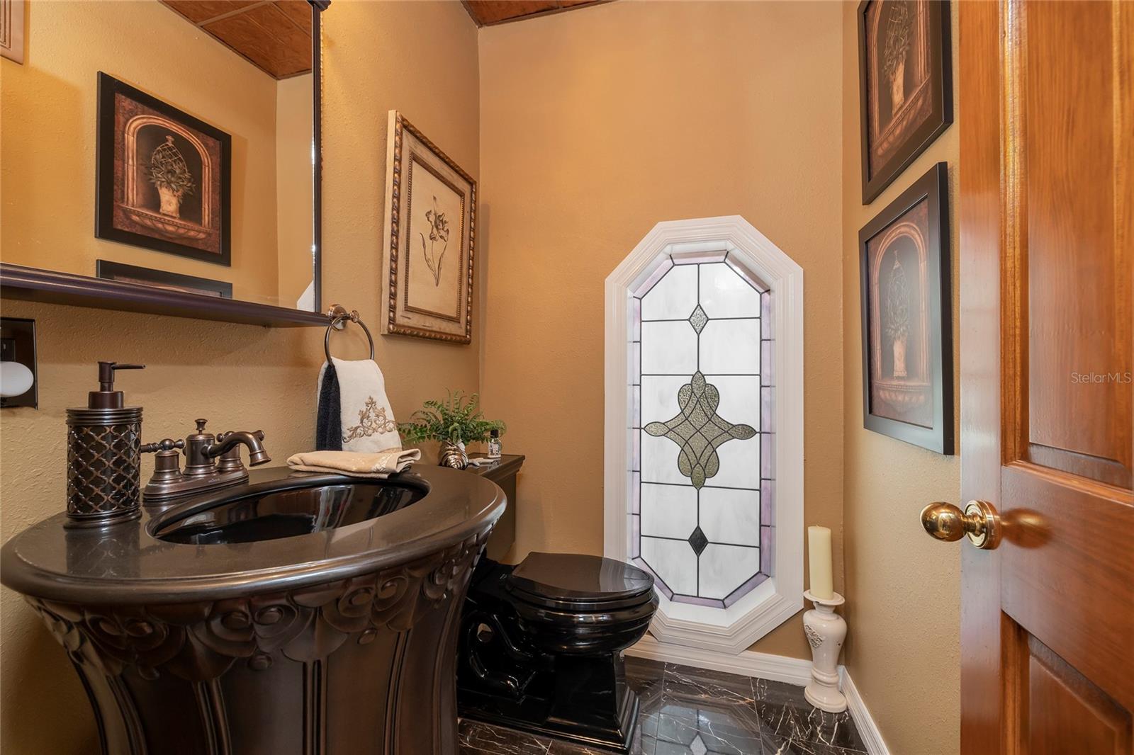 Beautiful powder room for guests on main floor
