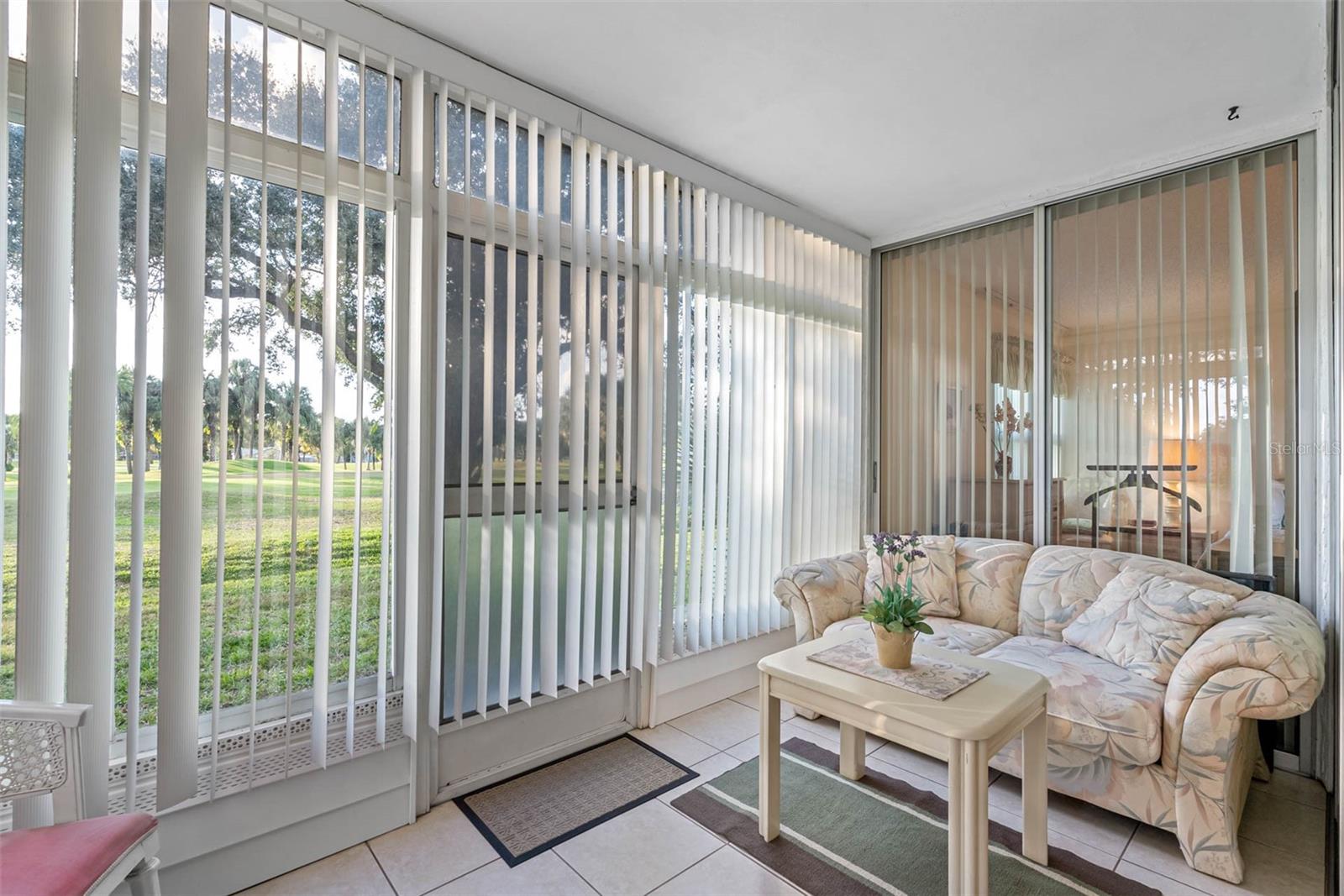 FLORIDA ROOM WITH GOLF COURSE VIEW