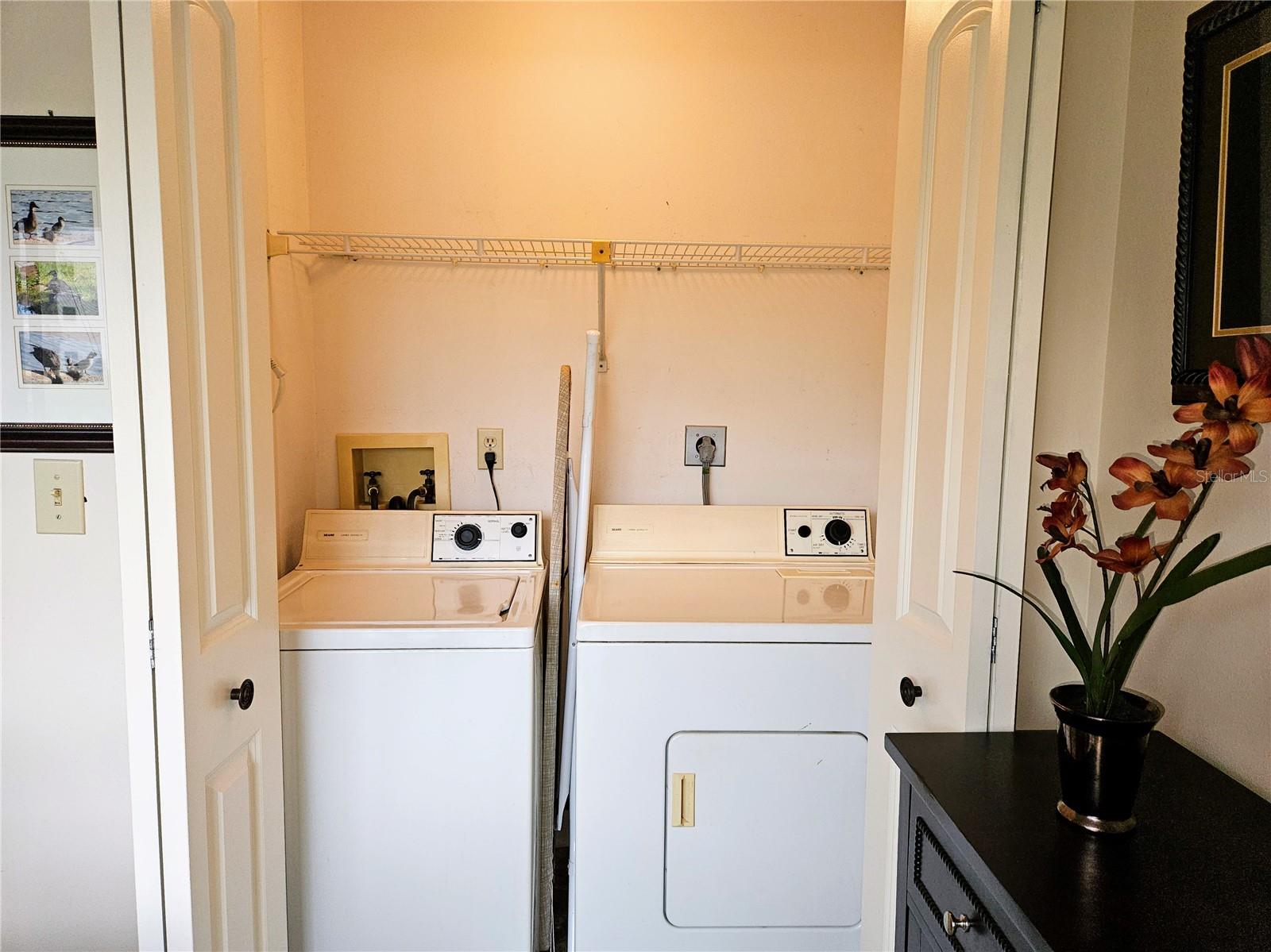 CONVENIENCE - Washer and Dryer Included in the Purchase of the Condo. Laundry Closet between Master Bedroom and Kitchen.