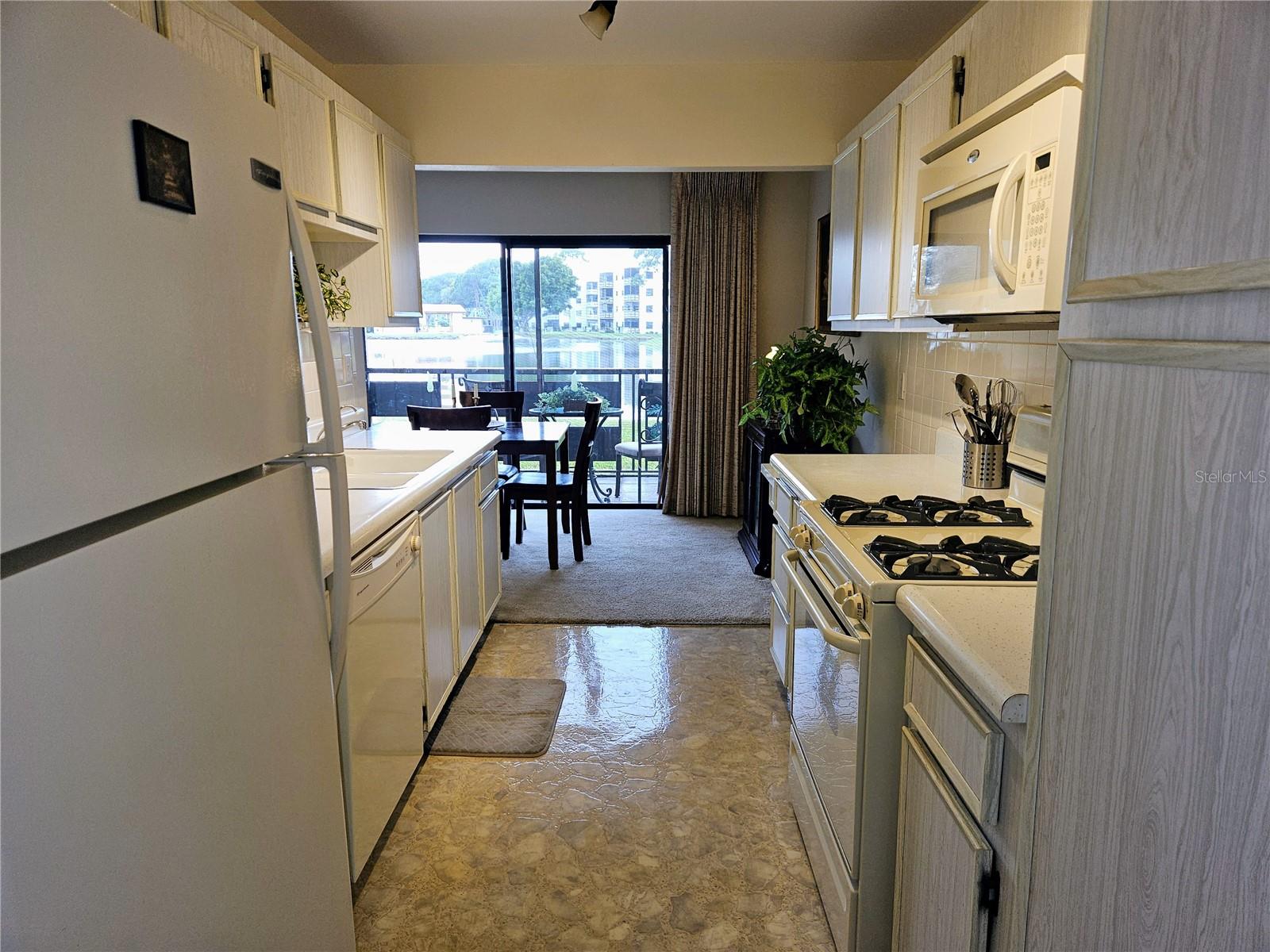 White Kitchen with White Appliances, Pantry Space