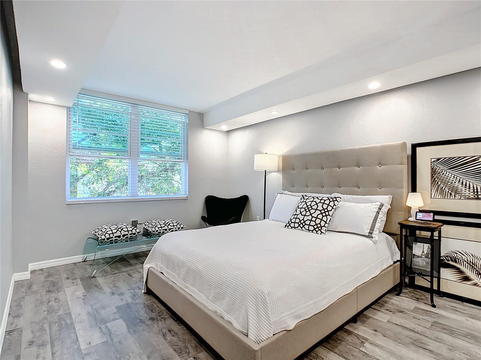 Master bedroom with large windows