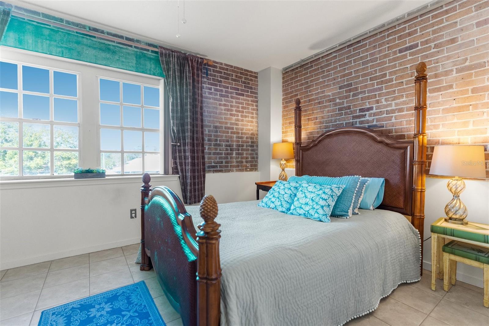 The Bedroom has Gorgeous Brick on TWO Walls !! WOW