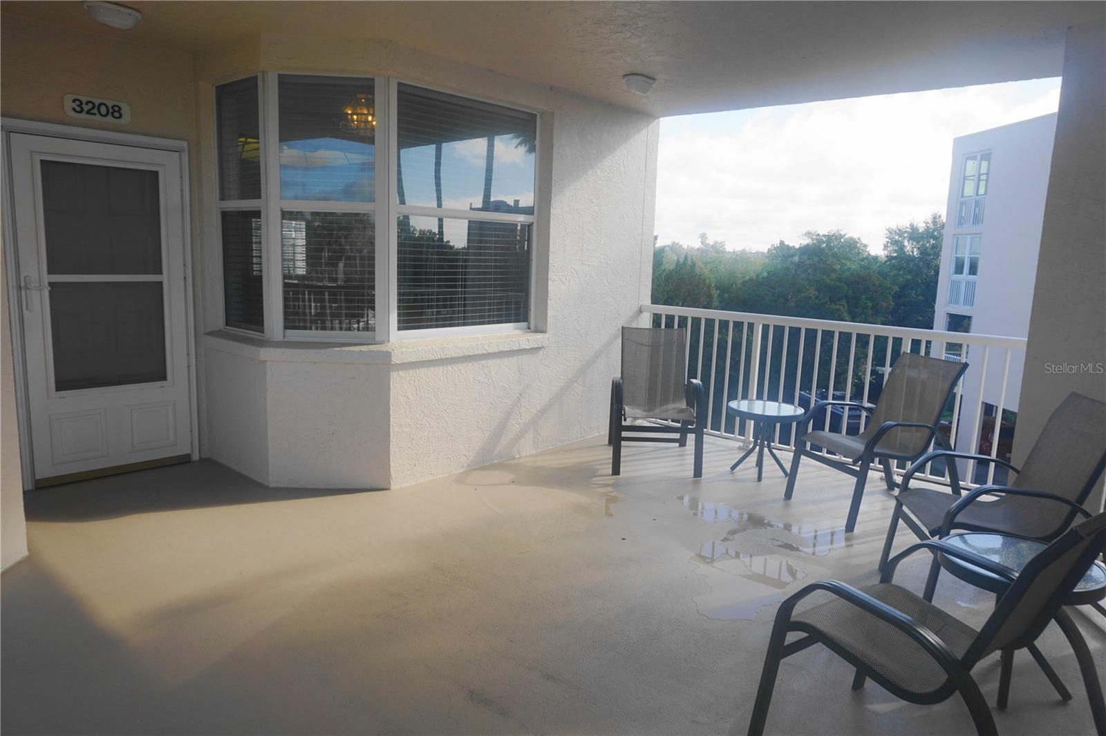 The entrance to the condo includes a large front patio -- another area great for entertaining!