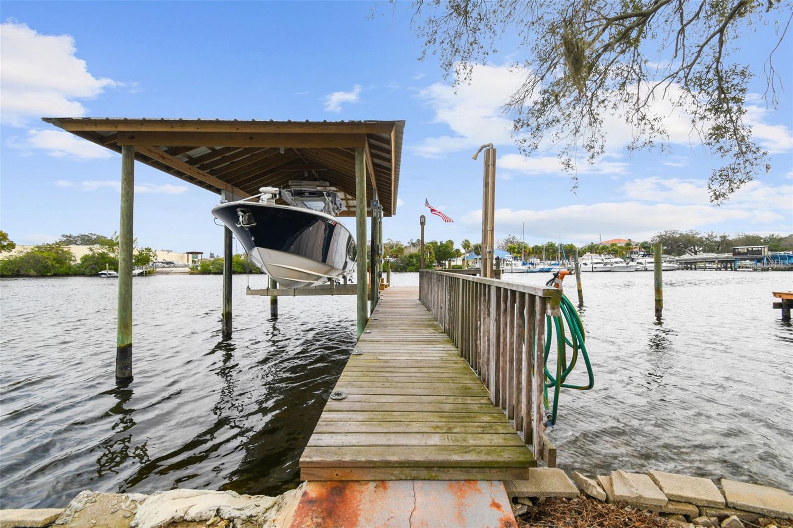 Boat Dock with a covered Metal Lift