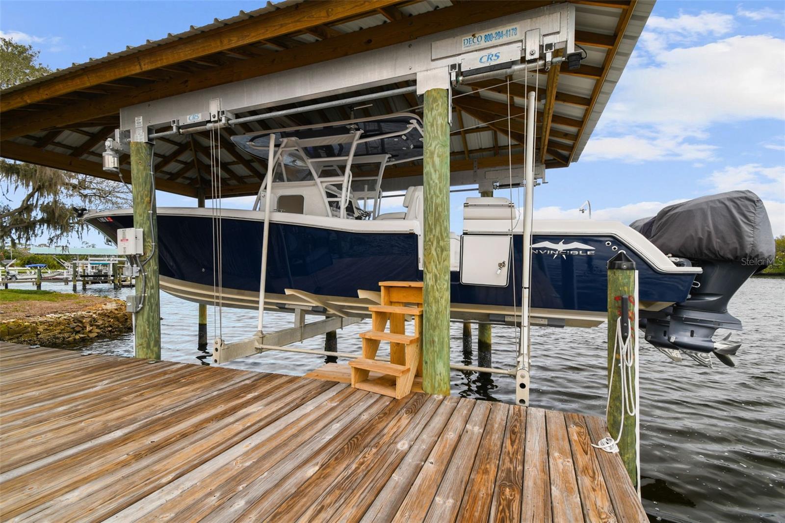 Covered Boat Lift on extended dock