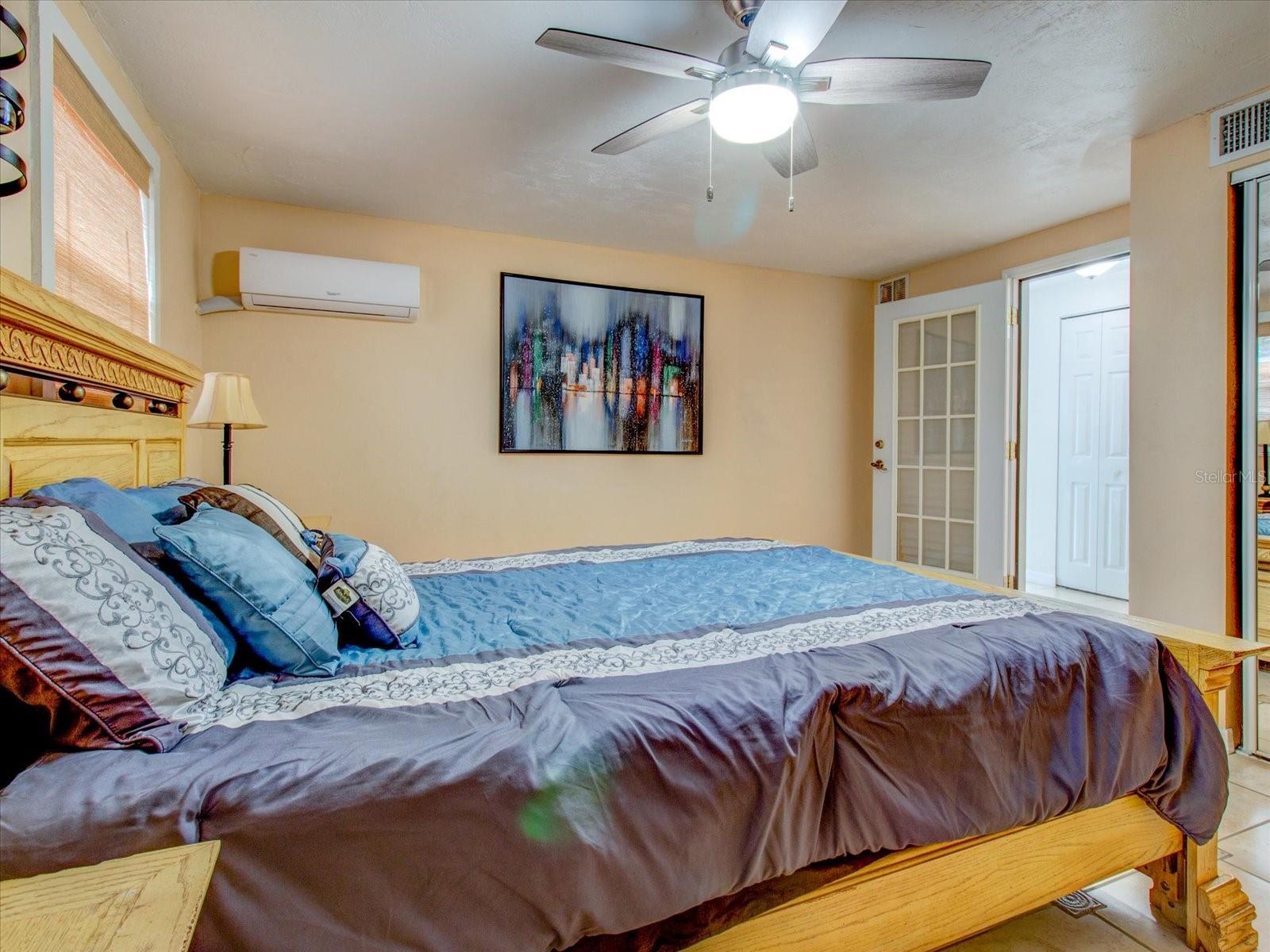 Primary Bedroom With Tile Floors, Ceiling Fan & Mini Split Unit #2