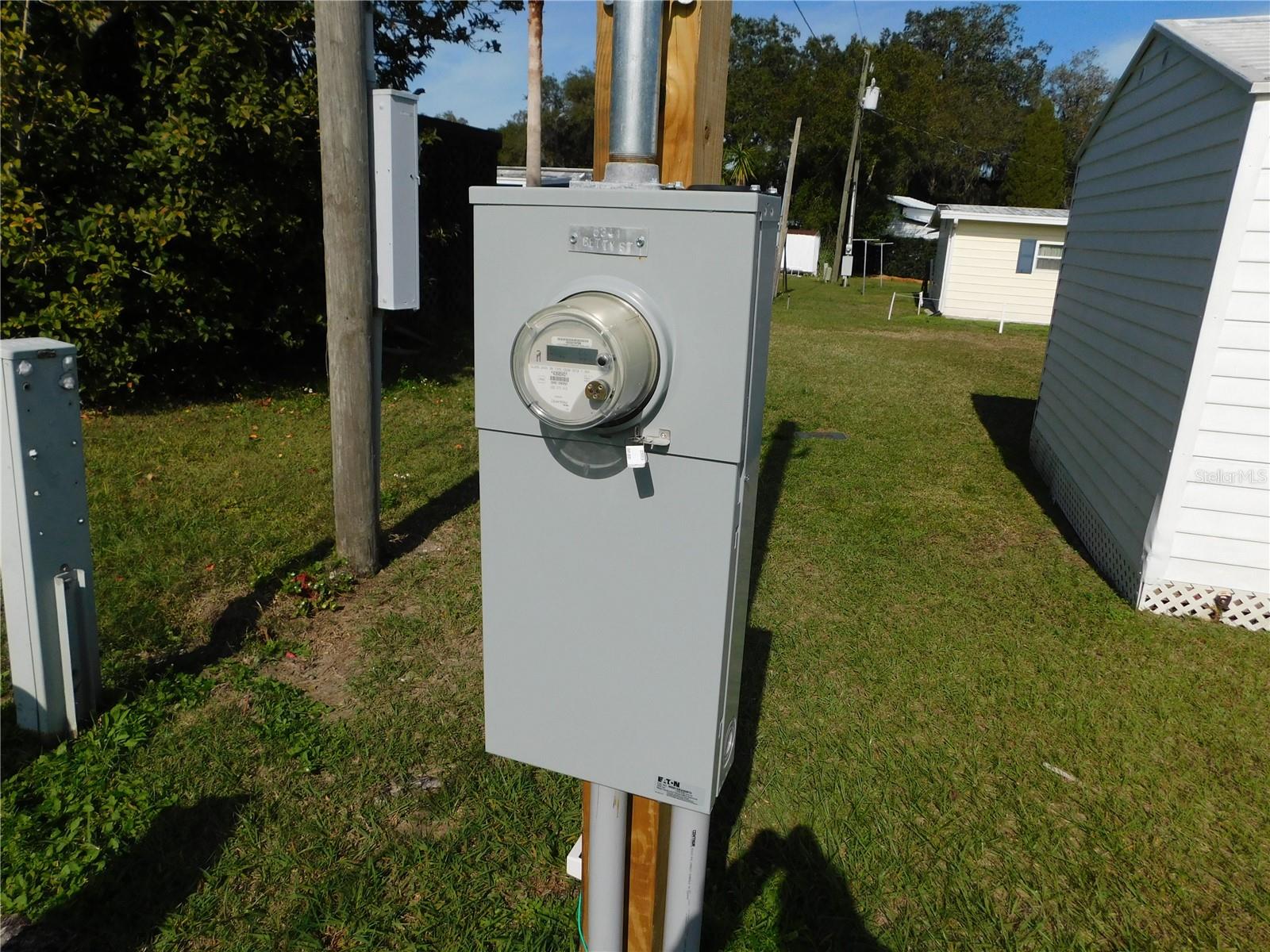 Recently updated outside electrical panel and pole.