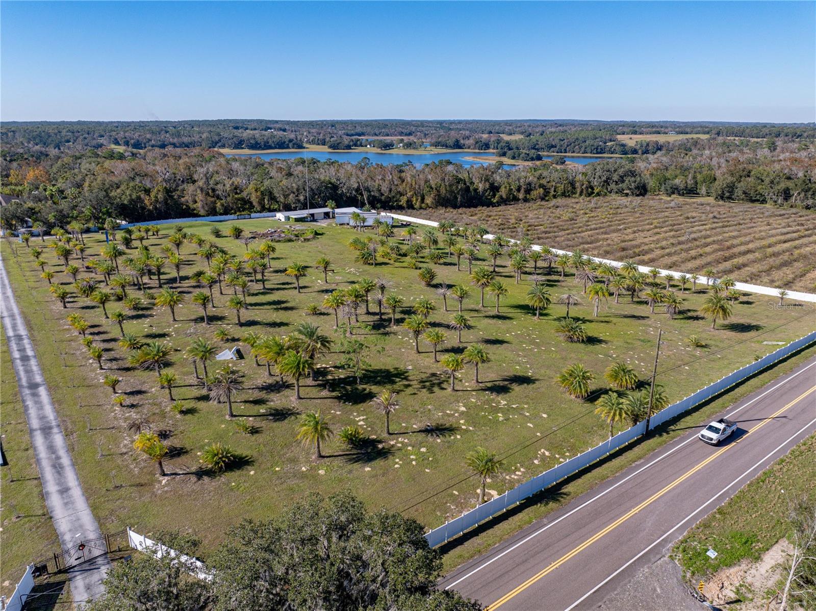 Facing west. Parcel 3 is approximate 6.77 acres, zone agricultural. It too, has a large barn and a lot of Spring Lake Hwy frontage. Perfect for a horsetrack and training area or farming as the neighbors do.