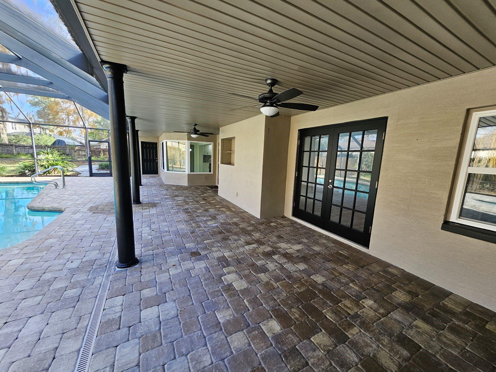 access from mudroom, Great Room and Master Suite to Lanai