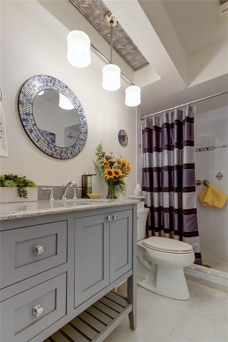 Detailed Design Aesthetic Throughout Home.. Really Shines in This Bathroom.. Very Art Deco!