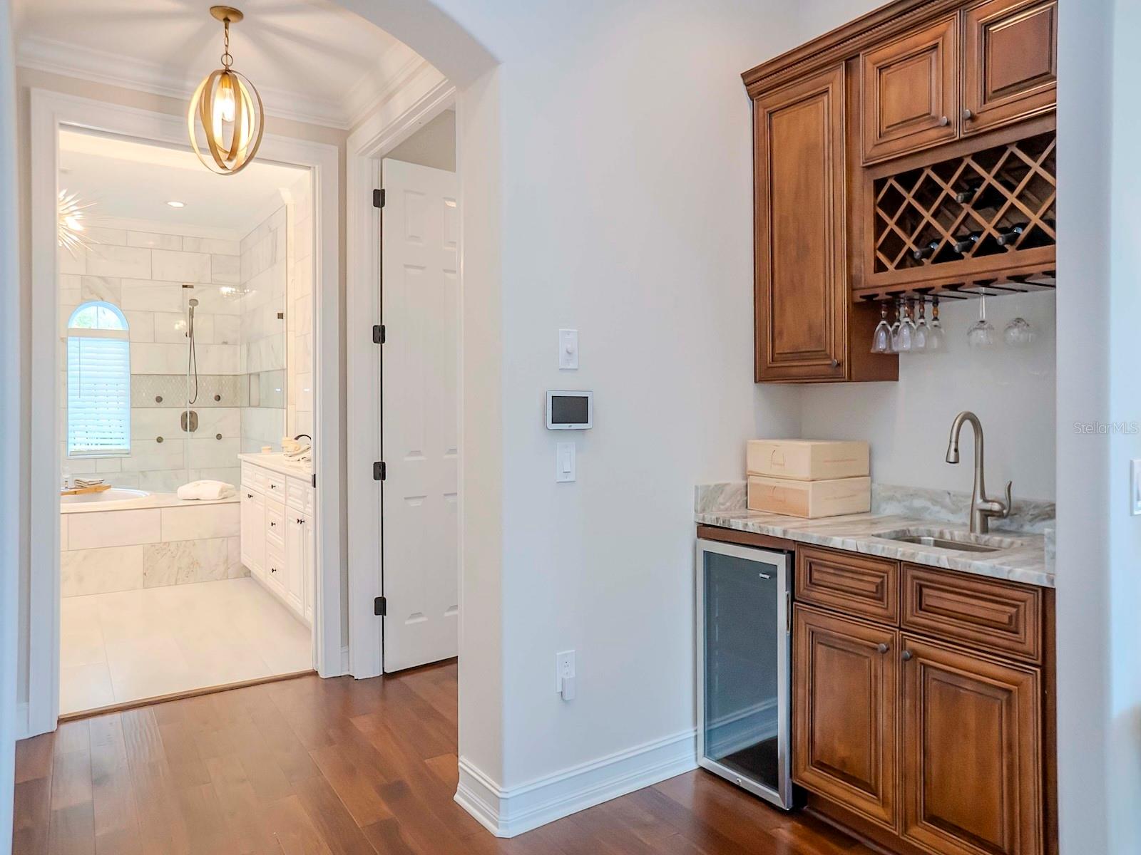 Master Suite Wet Bar and Entrance to Master Bathroom