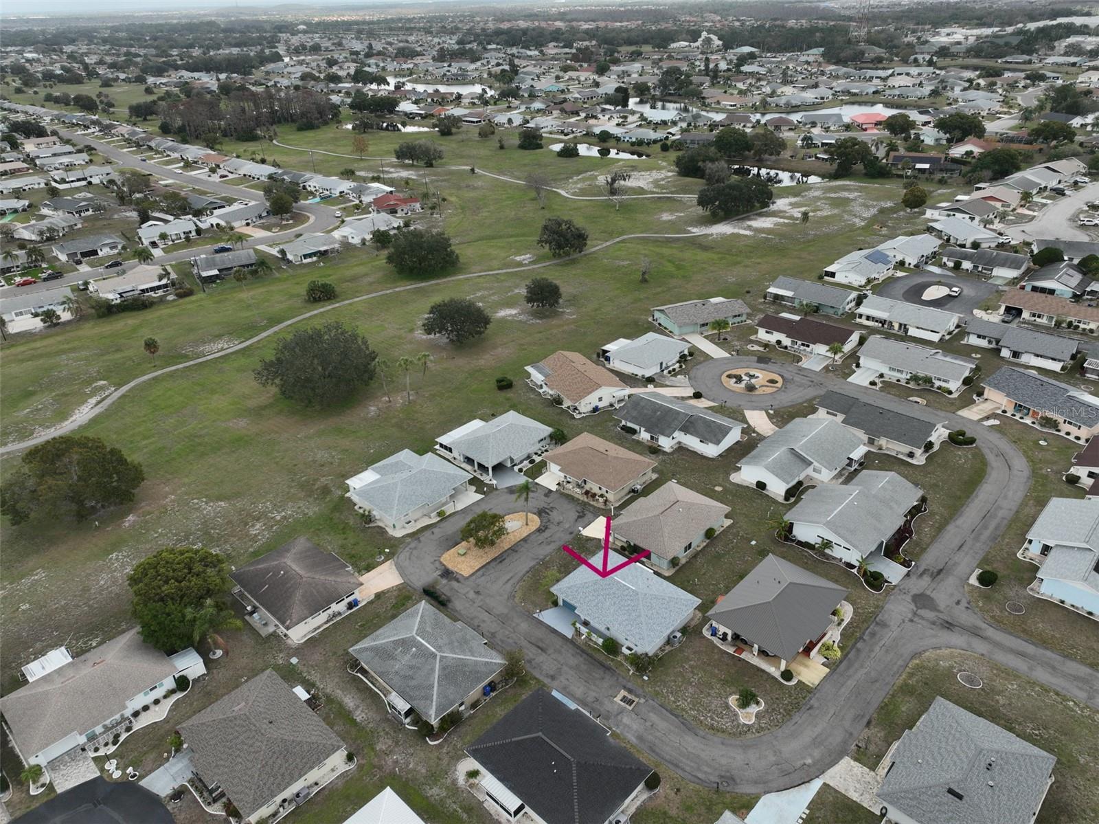 Aerial view of home & neighborhood