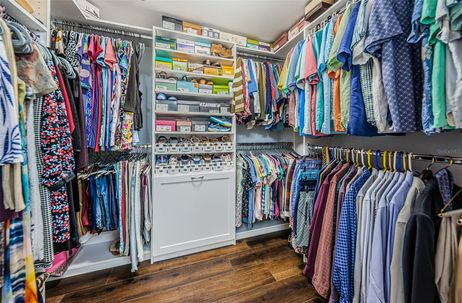 Large walk-in closet with custom built-ins!
