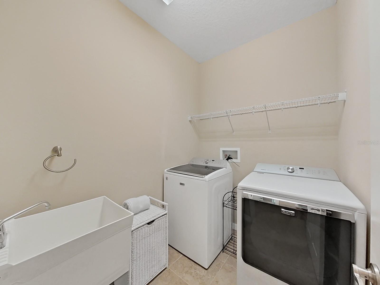 Convenient Laundry Room with Tub AND Appliances