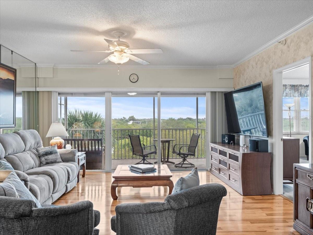 A screened-in balcony is located off the living room and balcony and features beautiful water views of the east.  Enjoy a cup of coffee and watch the sun rise each day.