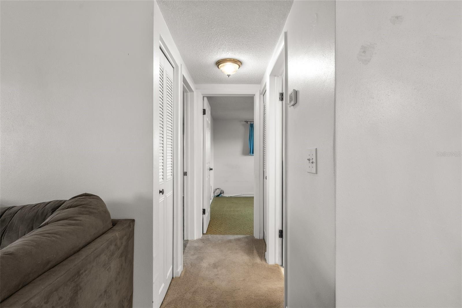Hallway with 2 Linen Closets