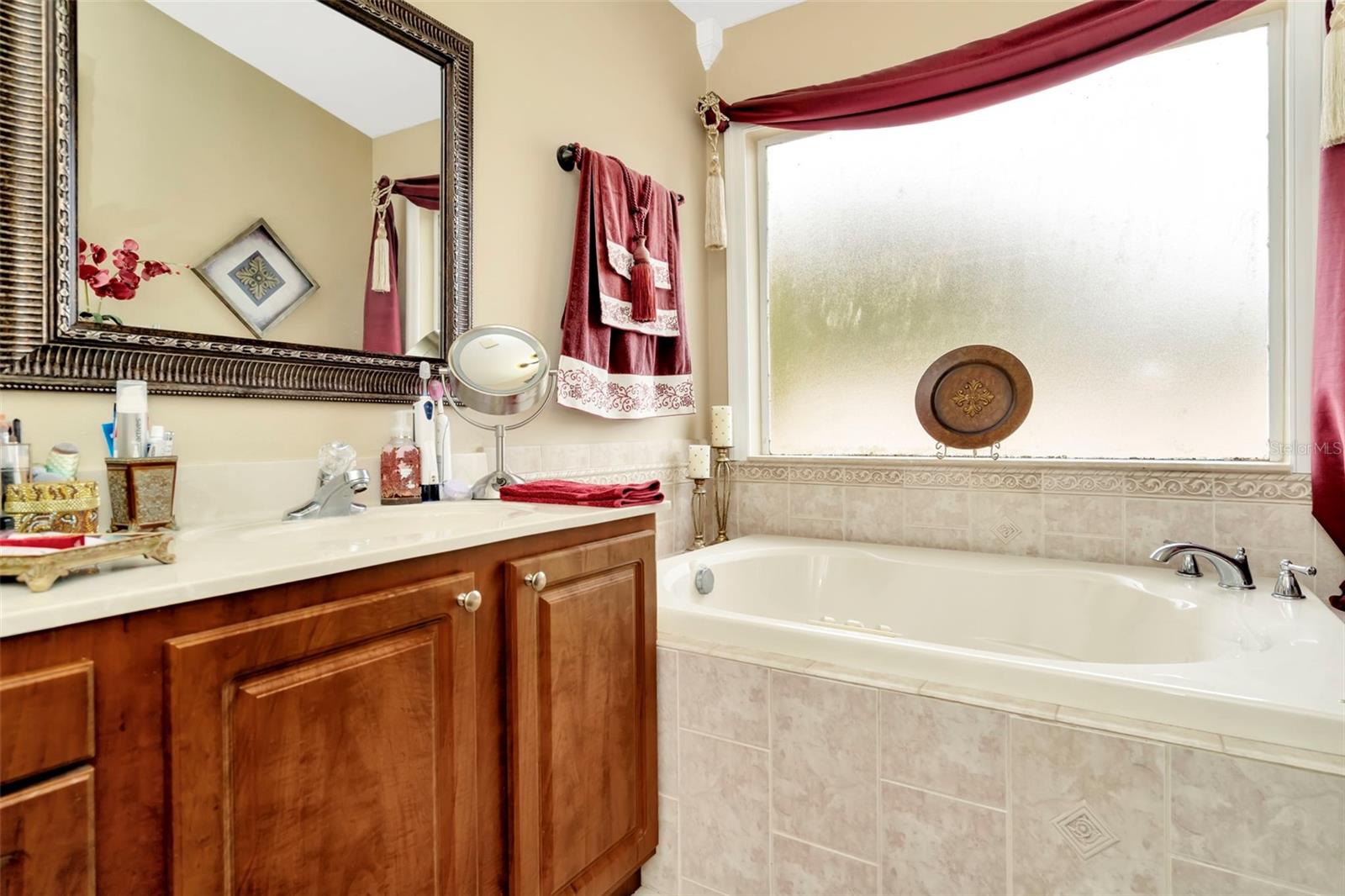 Well Lit bathroom and jetted bath tub